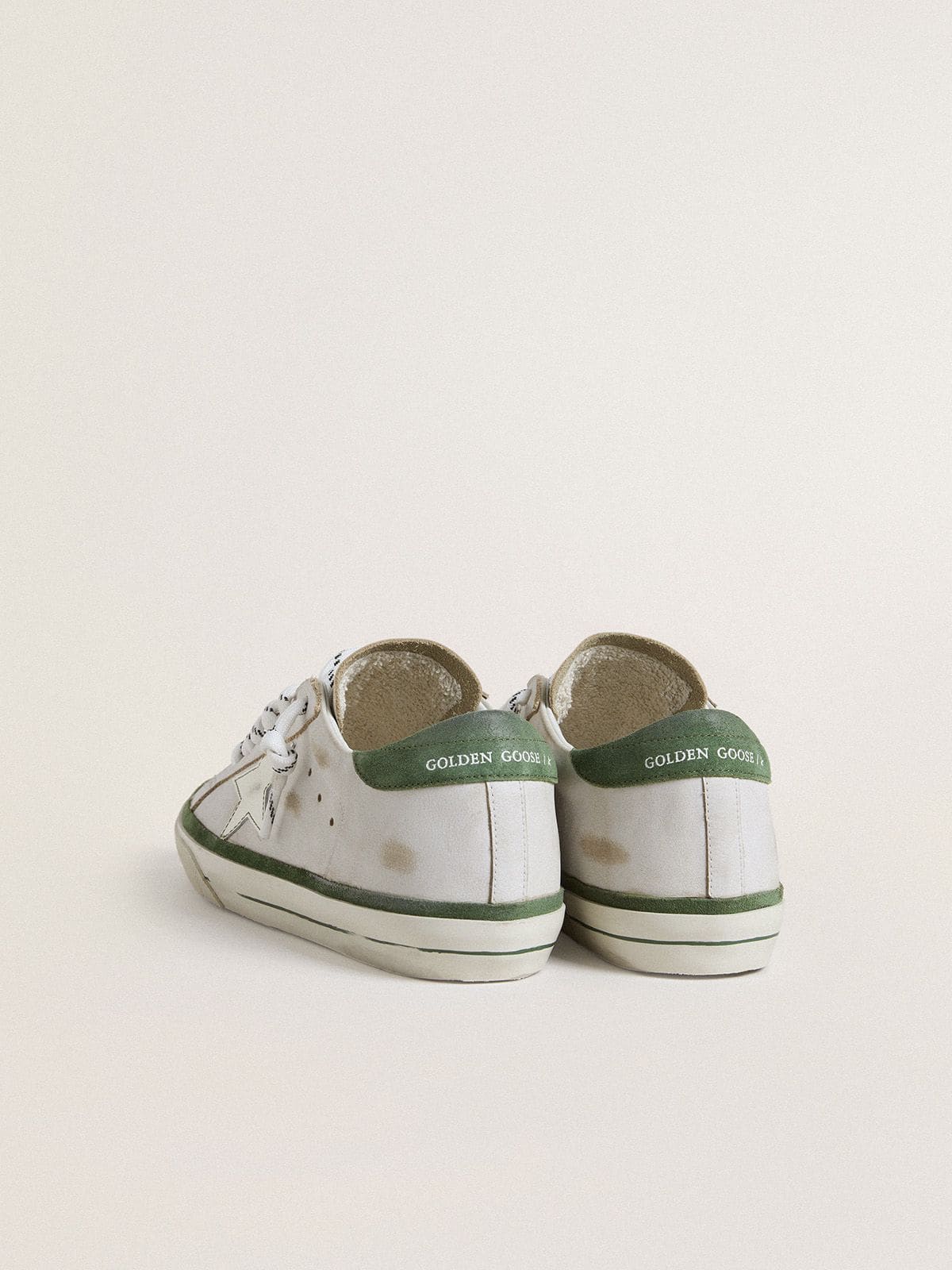 Women's Super-Star LTD with white leather star and green suede heel tab - Golden Goose Women