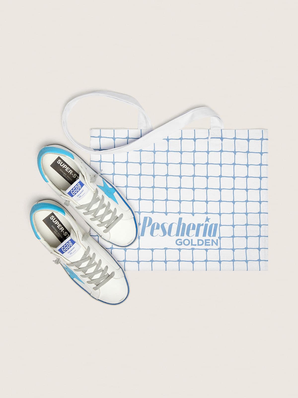 Women's Super-Star LTD in white leather with light blue leather star and heel tab - Golden Goose Women