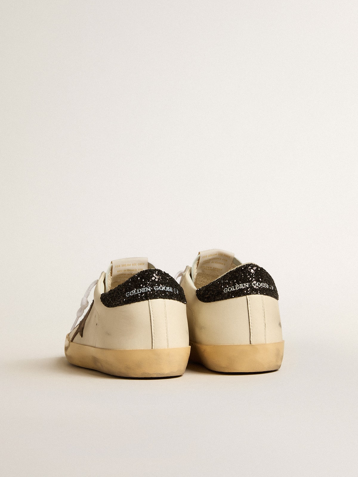 Super-Star LTD with laminated leather star and black glitter heel tab - Golden Goose Women