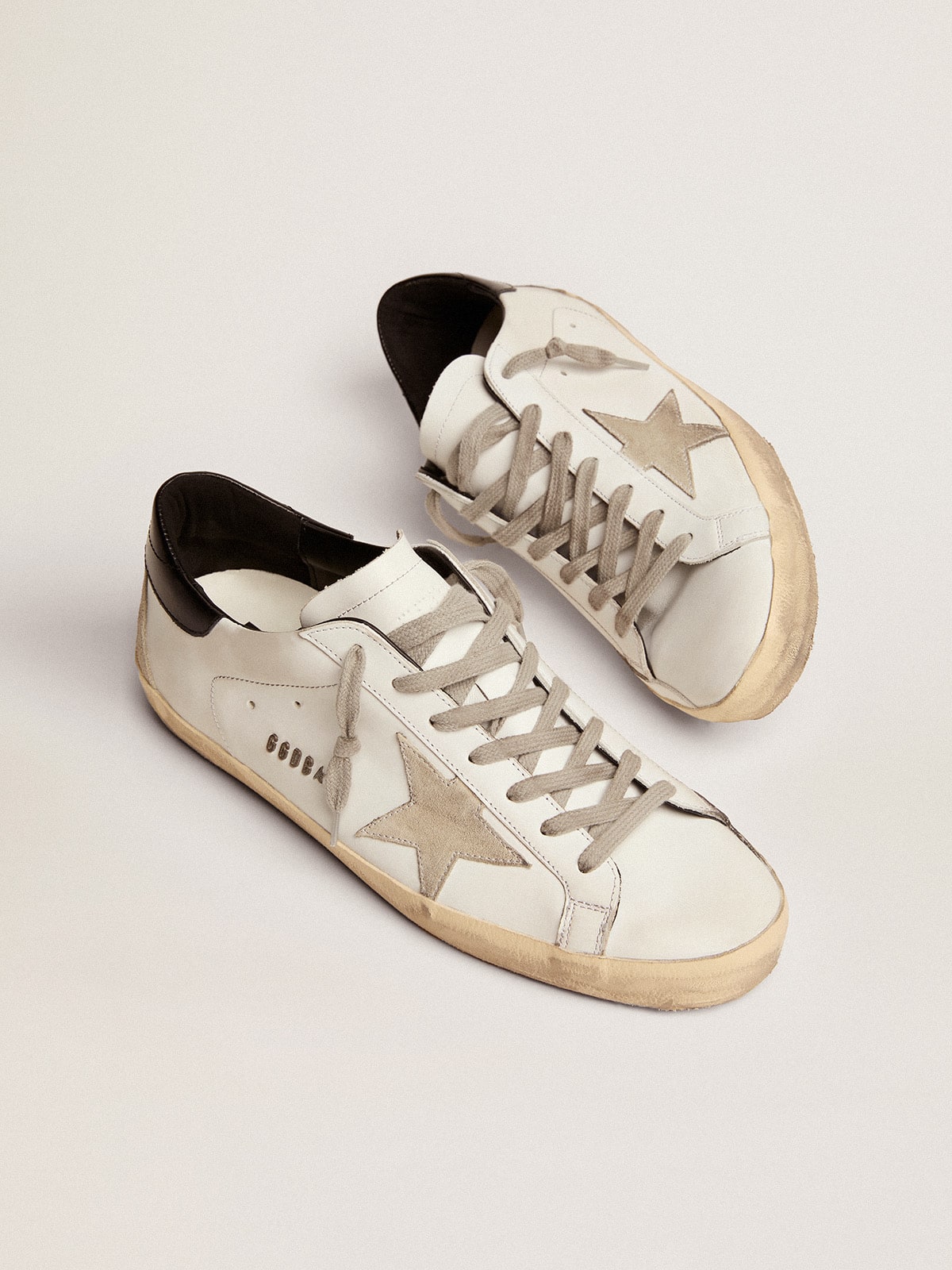 Men's Super-Star with black heel tab and metal stud lettering - Golden Goose Men