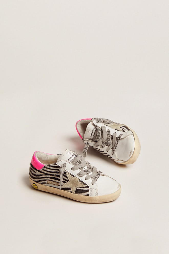 Junior Super-Star in leather and zebra-print pony skin with fuchsia heel tab - Golden Goose Kids