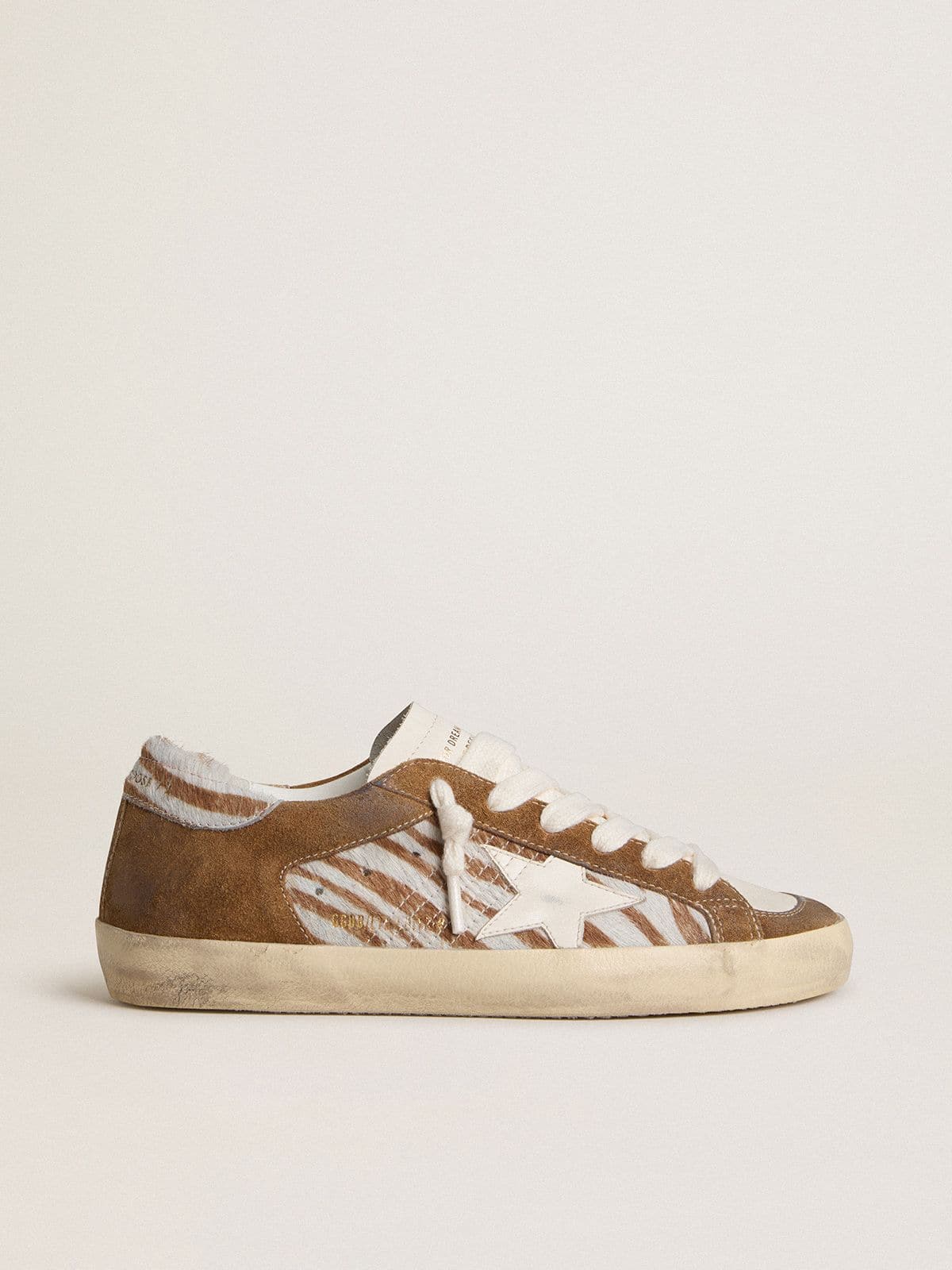 Women's Super-Star in zebra-print pony skin with leather star and brown suede inserts - Golden Goose Women