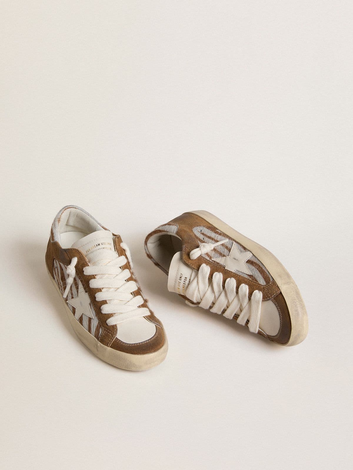 Women's Super-Star in zebra-print pony skin with leather star and brown suede inserts - Golden Goose Women