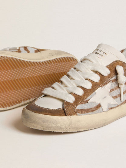 Women's Super-Star in zebra-print pony skin with leather star and brown suede inserts - Golden Goose Women