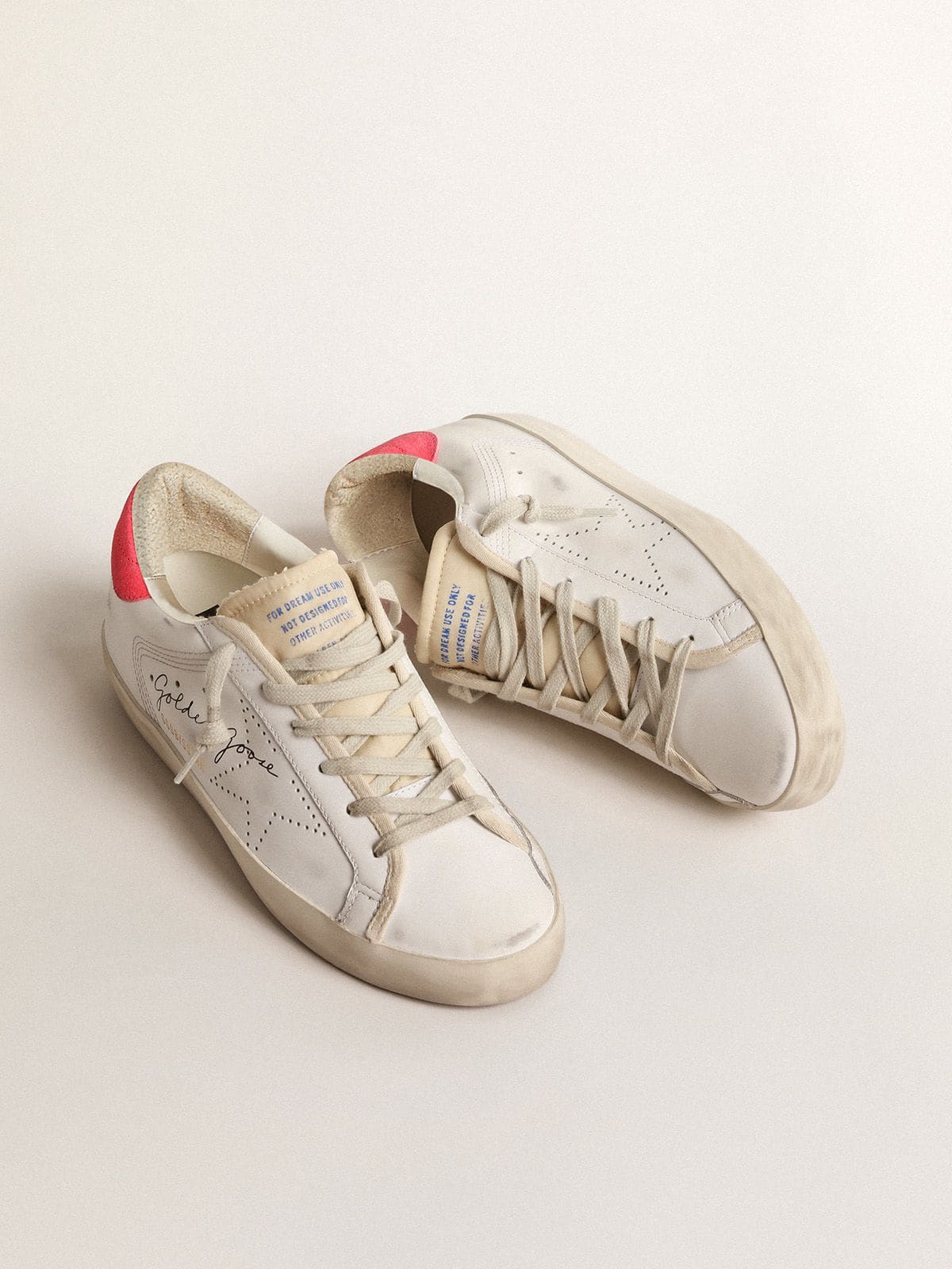 Women's white leather Super-Star with perforated star and fuchsia nylon heel tab - Golden Goose Women