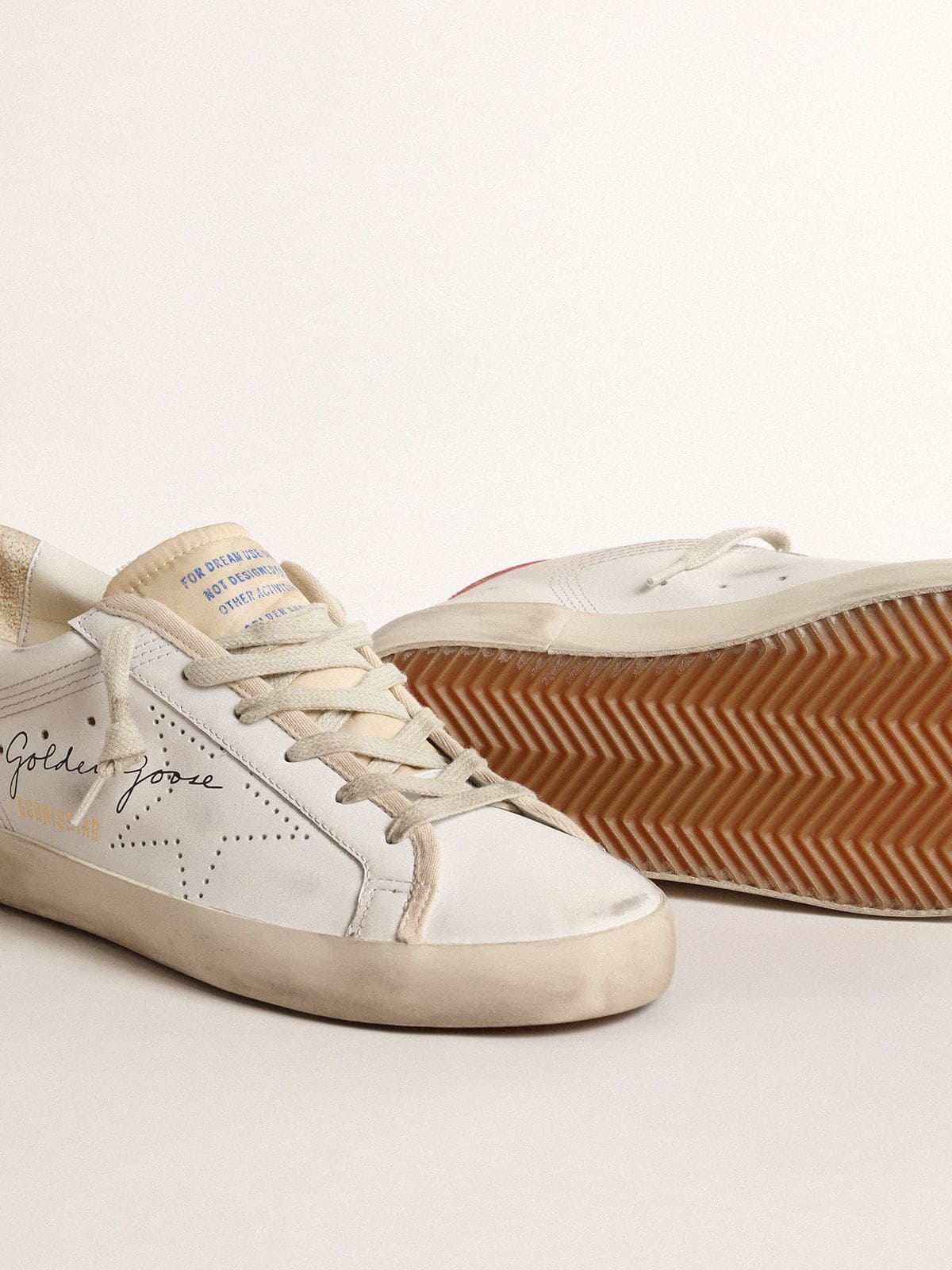 Women's white leather Super-Star with perforated star and fuchsia nylon heel tab - Golden Goose Women