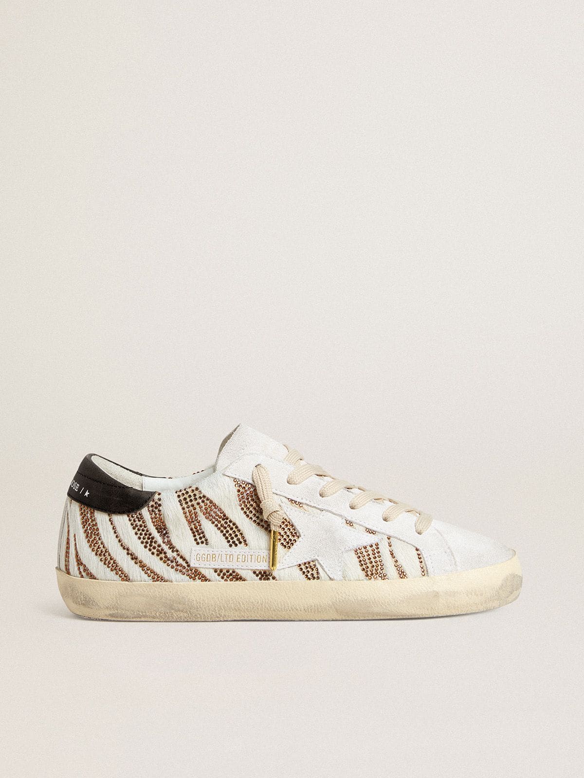 Women’s Super-Star LTD in white pony skin with brown glitter and white suede star - Golden Goose Women