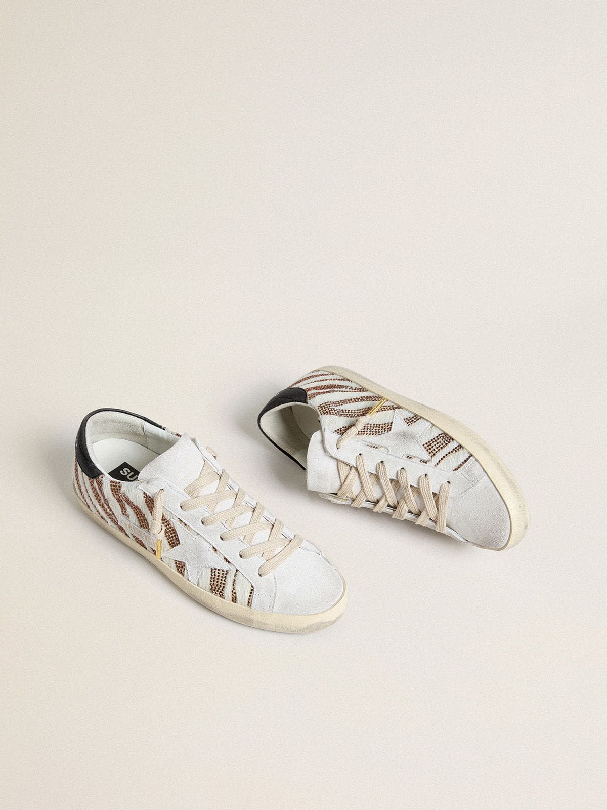 Women’s Super-Star LTD in white pony skin with brown glitter and white suede star - Golden Goose Women