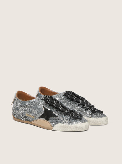 Women's True-Star in silver sequins with black star and silver leather heel tab - Golden Goose Women