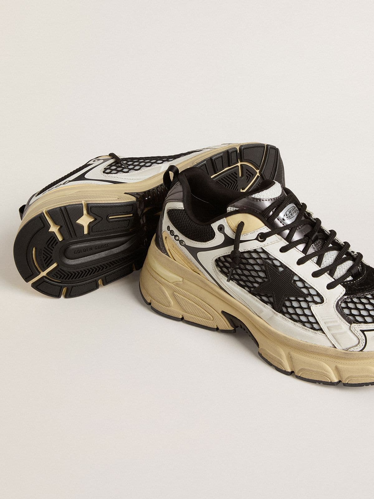Women’s Lightstar in white leather and black mesh with black TPU star - Golden Goose Women