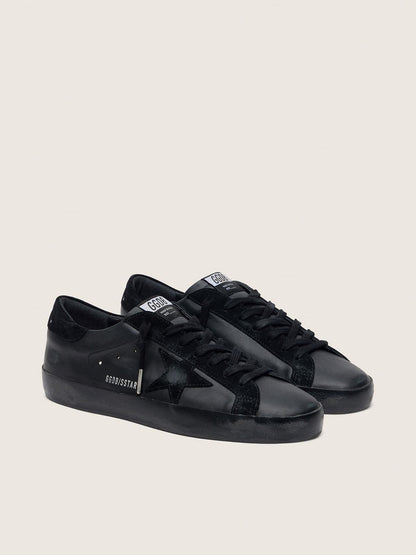 Women's Super-Star in black nappa with black suede star and heel tab - Golden Goose Women