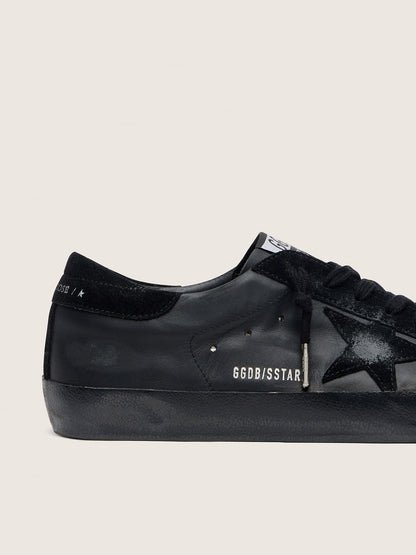 Women's Super-Star in black nappa with black suede star and heel tab - Golden Goose Women