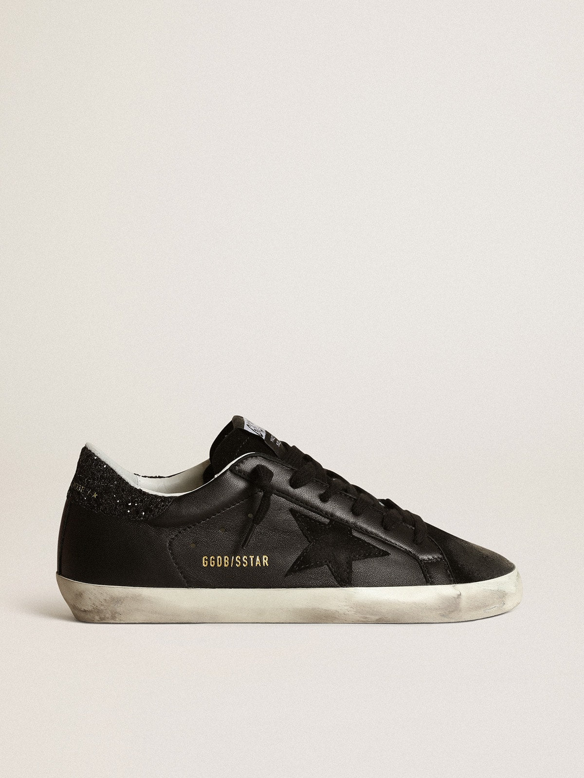 Women's Super-Star in black nappa with black star and glitter heel tab - Golden Goose Women