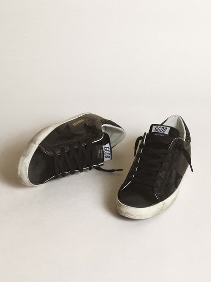 Women's Super-Star in black nappa with black star and glitter heel tab - Golden Goose Women