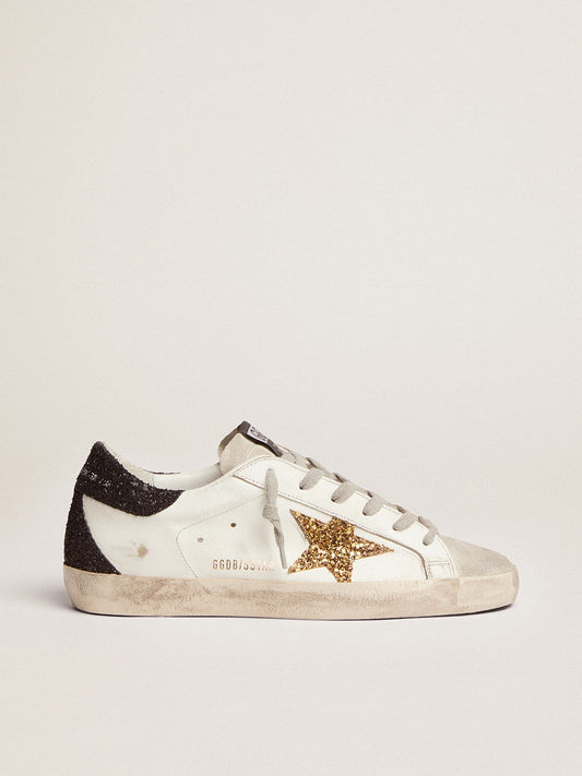 Women’s Super-Star in nappa leather with gold glitter star and black glitter heel tab - Golden Goose Women