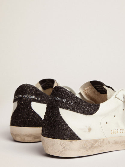 Women’s Super-Star in nappa leather with gold glitter star and black glitter heel tab - Golden Goose Women