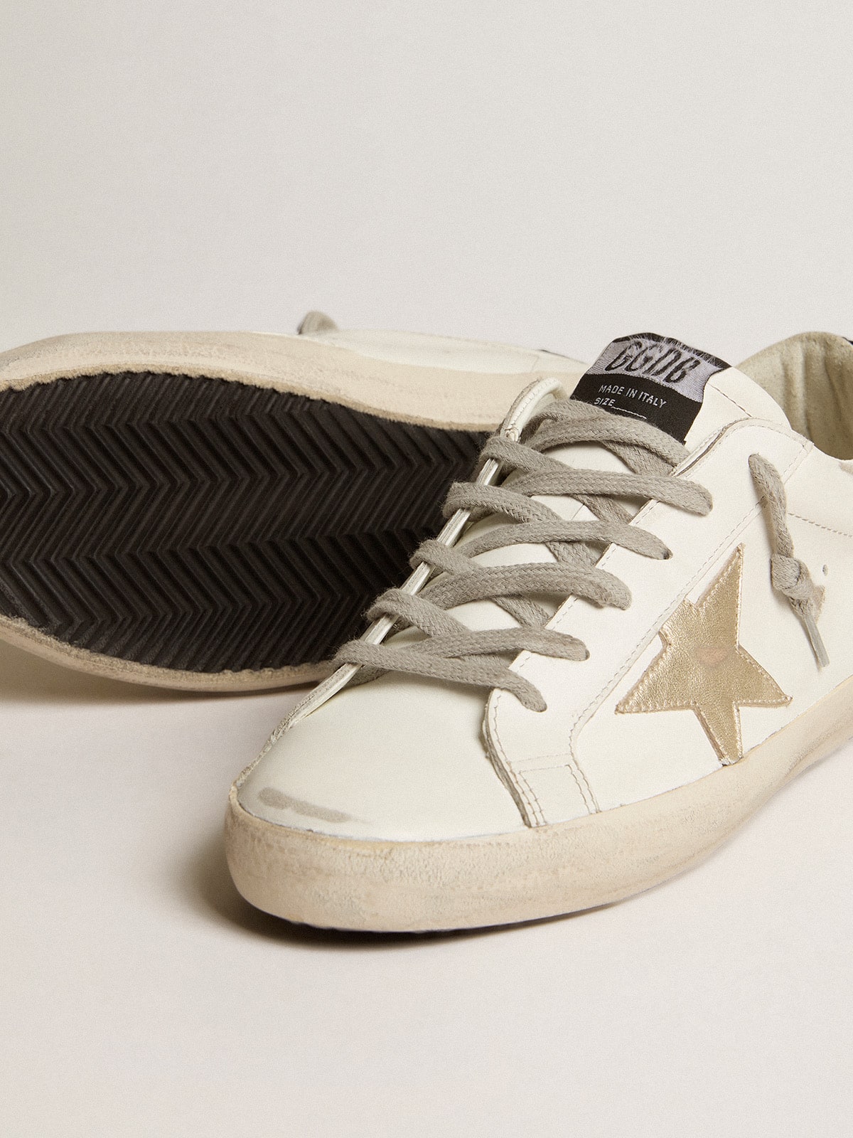 Women's Super-Star with gold star and black glitter heel tab - Golden Goose Women