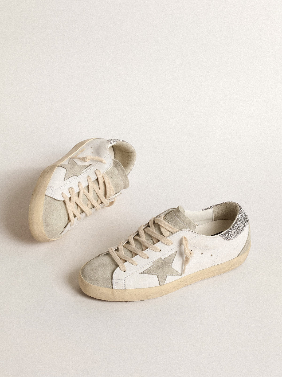Women's Super-Star with gray star and silver glitter heel tab - Golden Goose Women