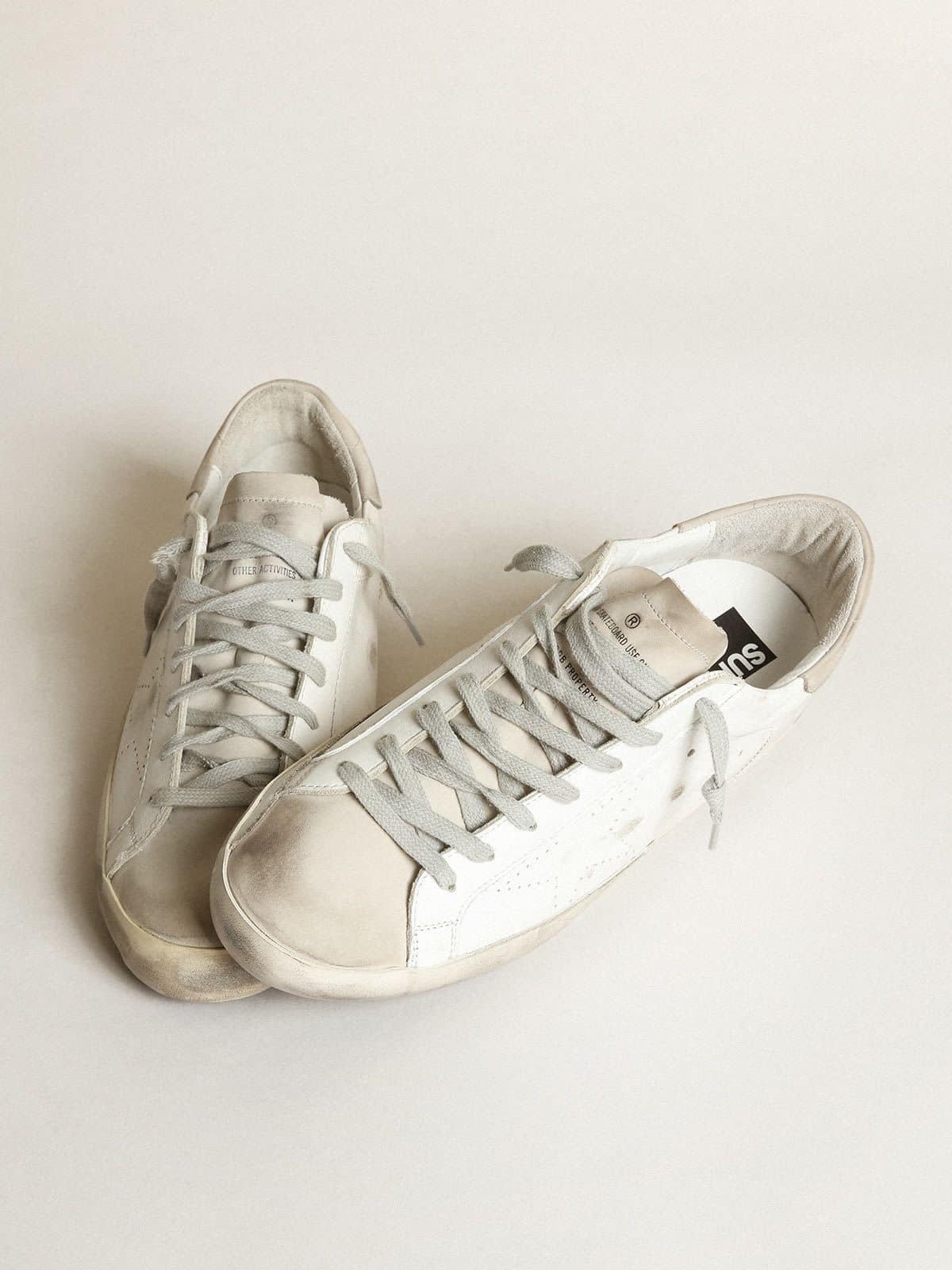 Women's Super-Star in white leather with perforated star and beige nubuck heel tab - Golden Goose Women