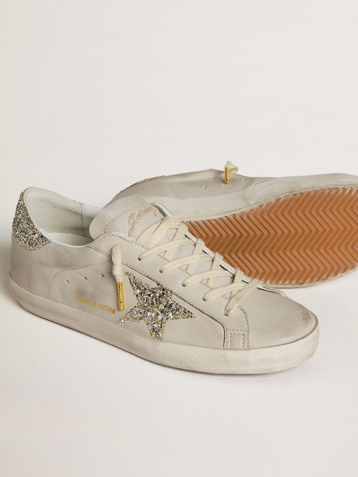 Women's Super-Star  in ivory nappa leather with platinum glitter star and heel tab - Golden Goose Women