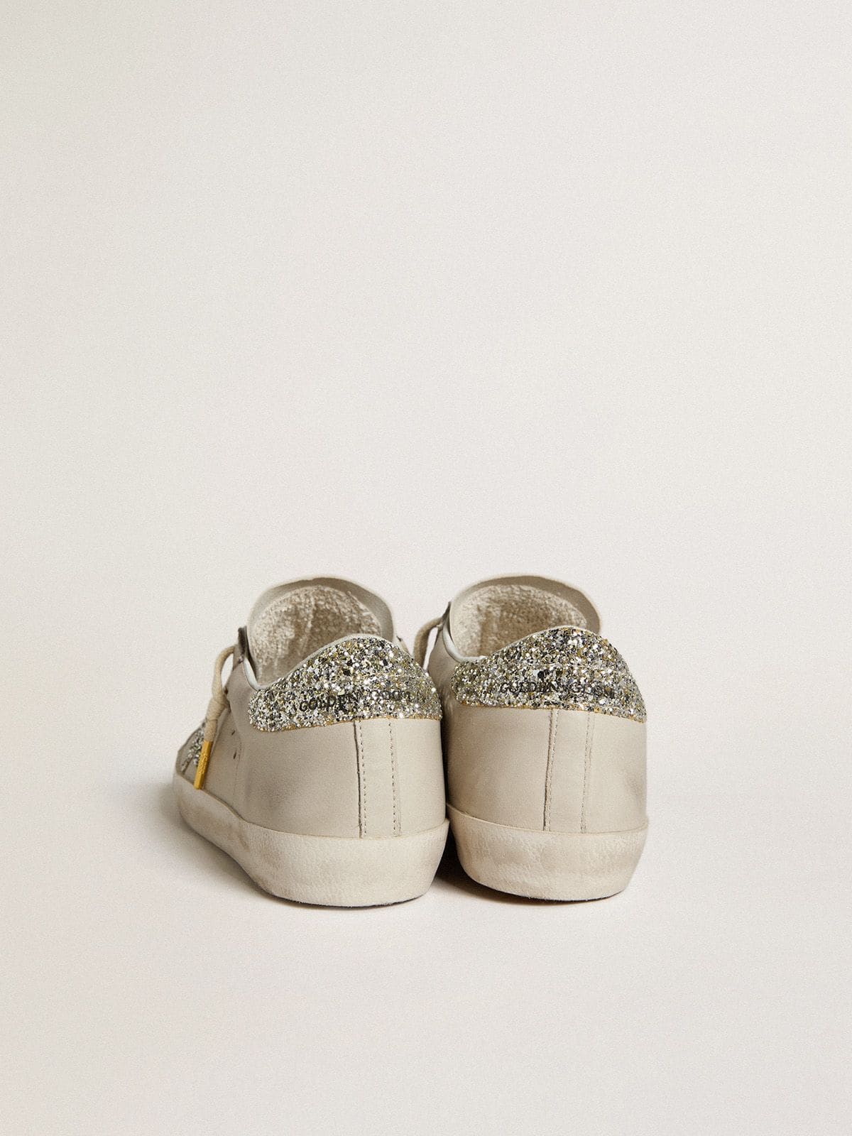 Women's Super-Star  in ivory nappa leather with platinum glitter star and heel tab - Golden Goose Women