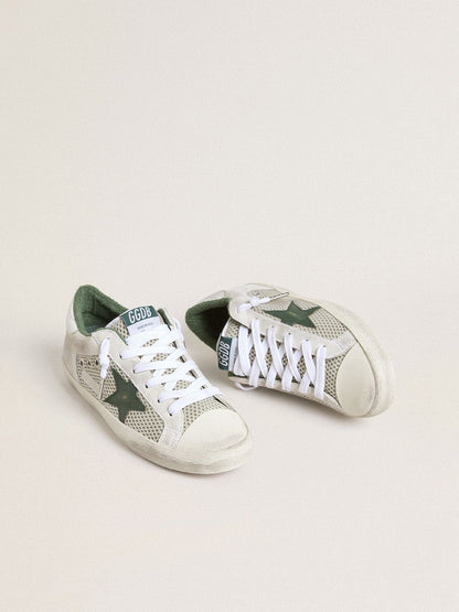 Women’s Super-Star LTD in white suede and mesh with green leather star and silver foiled leather heel tab - Golden Goose Women