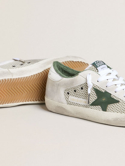 Women’s Super-Star LTD in white suede and mesh with green leather star and silver foiled leather heel tab - Golden Goose Women