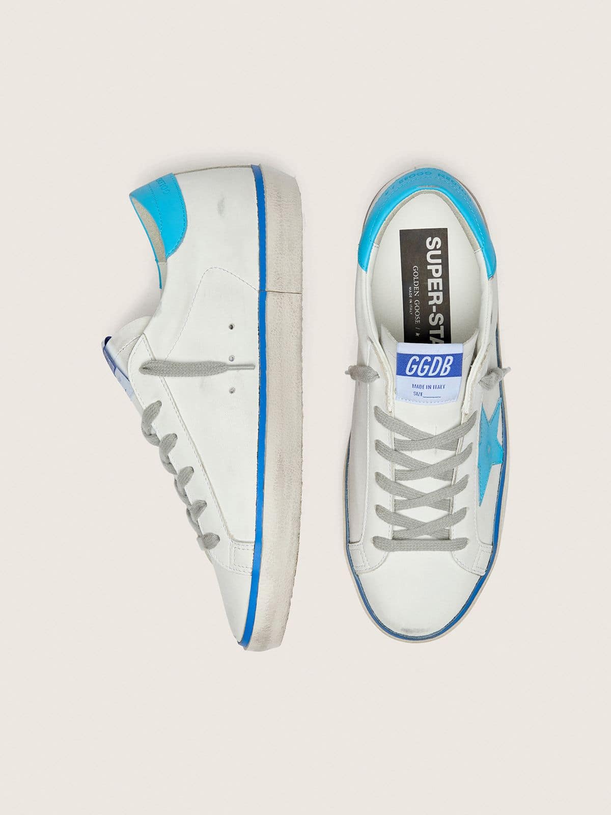 Women's Super-Star LTD in white leather with light blue leather star and heel tab - Golden Goose Women