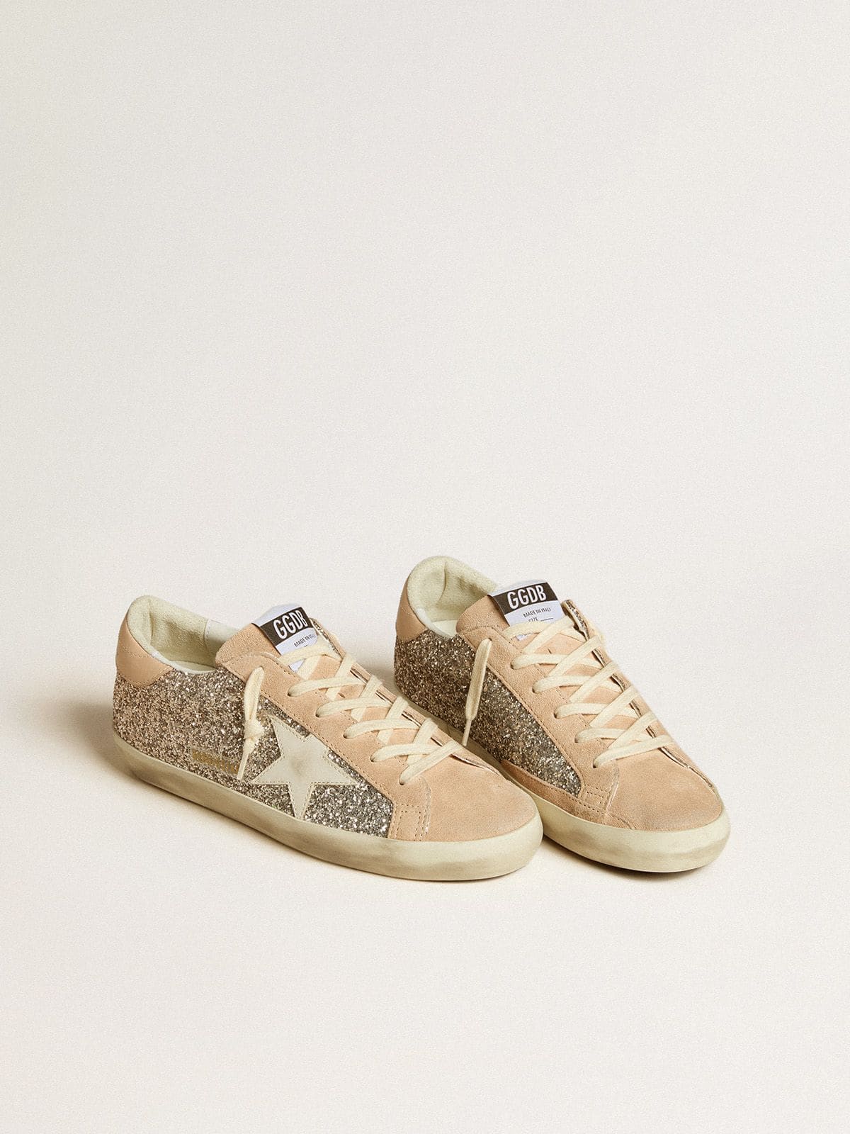Women’s Super-Star in silver glitter with leather star and heel tab - Golden Goose Women