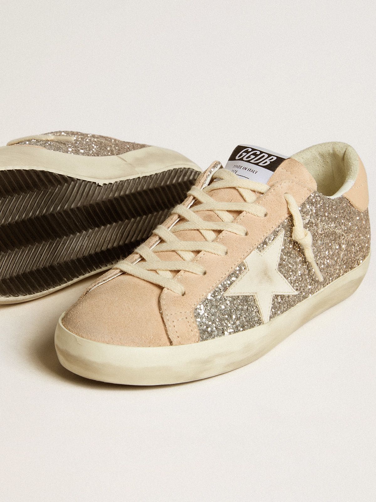 Women’s Super-Star in silver glitter with leather star and heel tab - Golden Goose Women