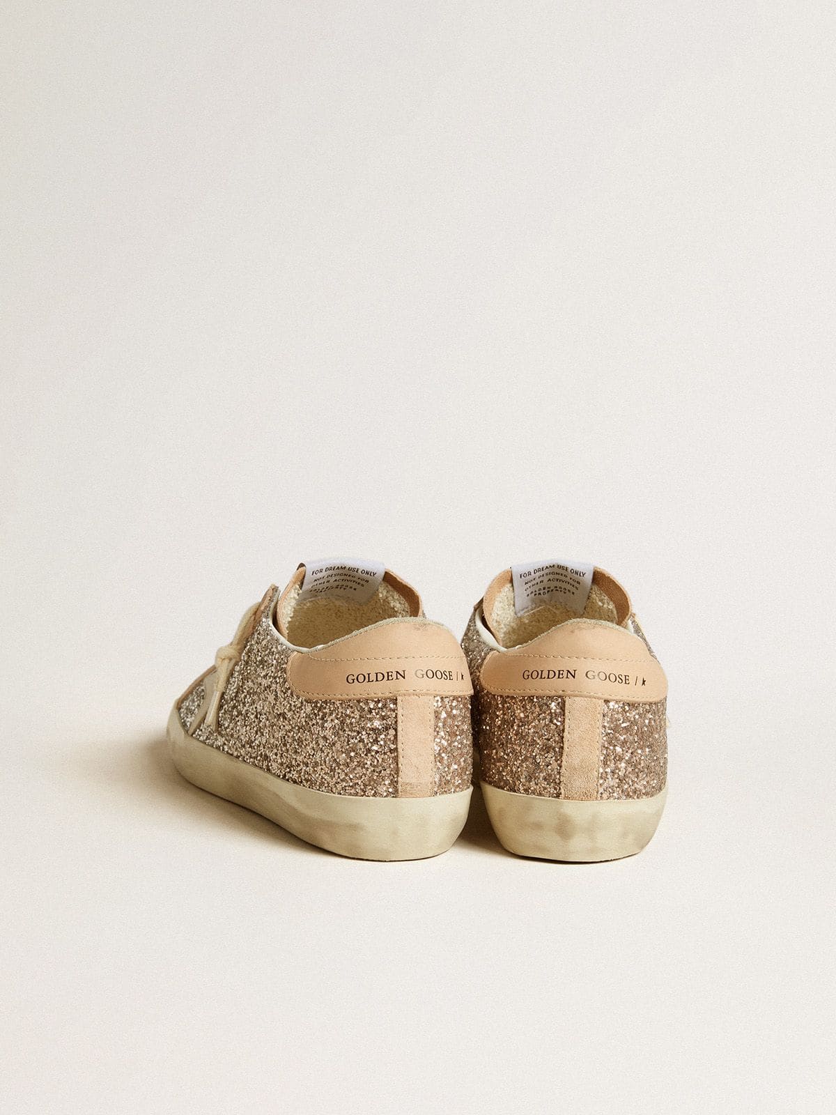 Women’s Super-Star in silver glitter with leather star and heel tab - Golden Goose Women