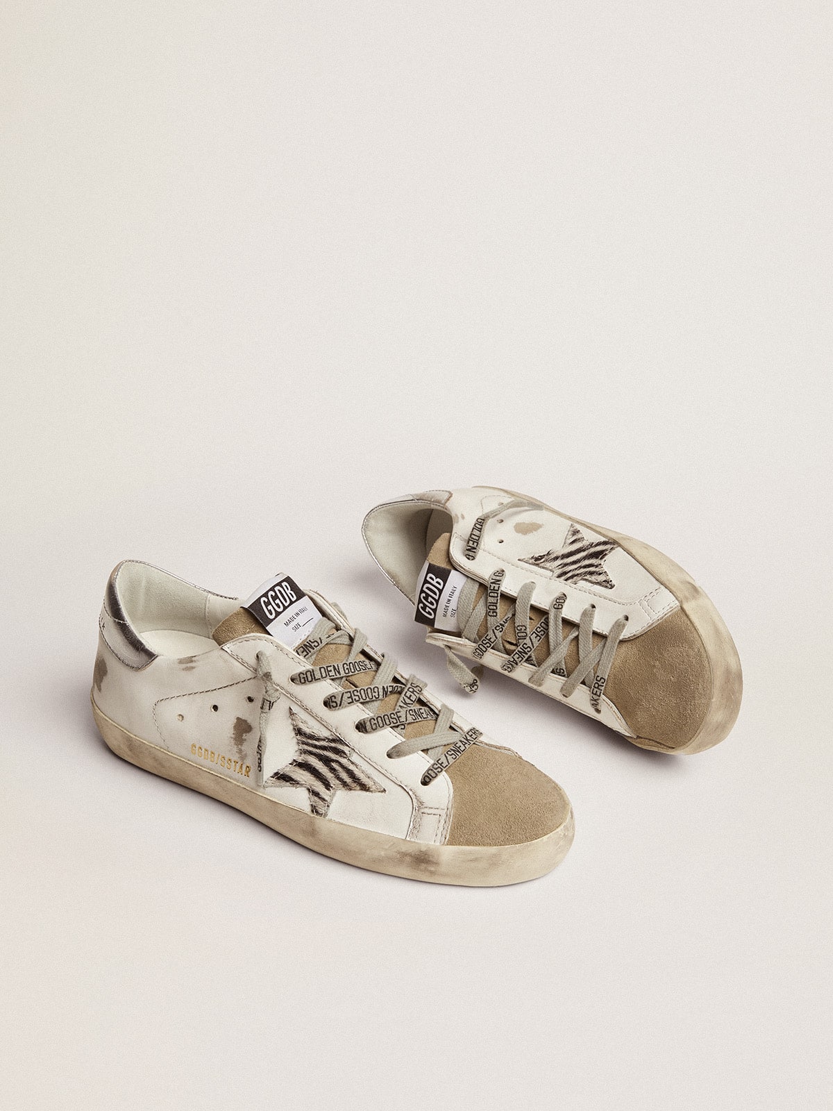 Women's Super-Star with zebra print pony skin star - Golden Goose Women