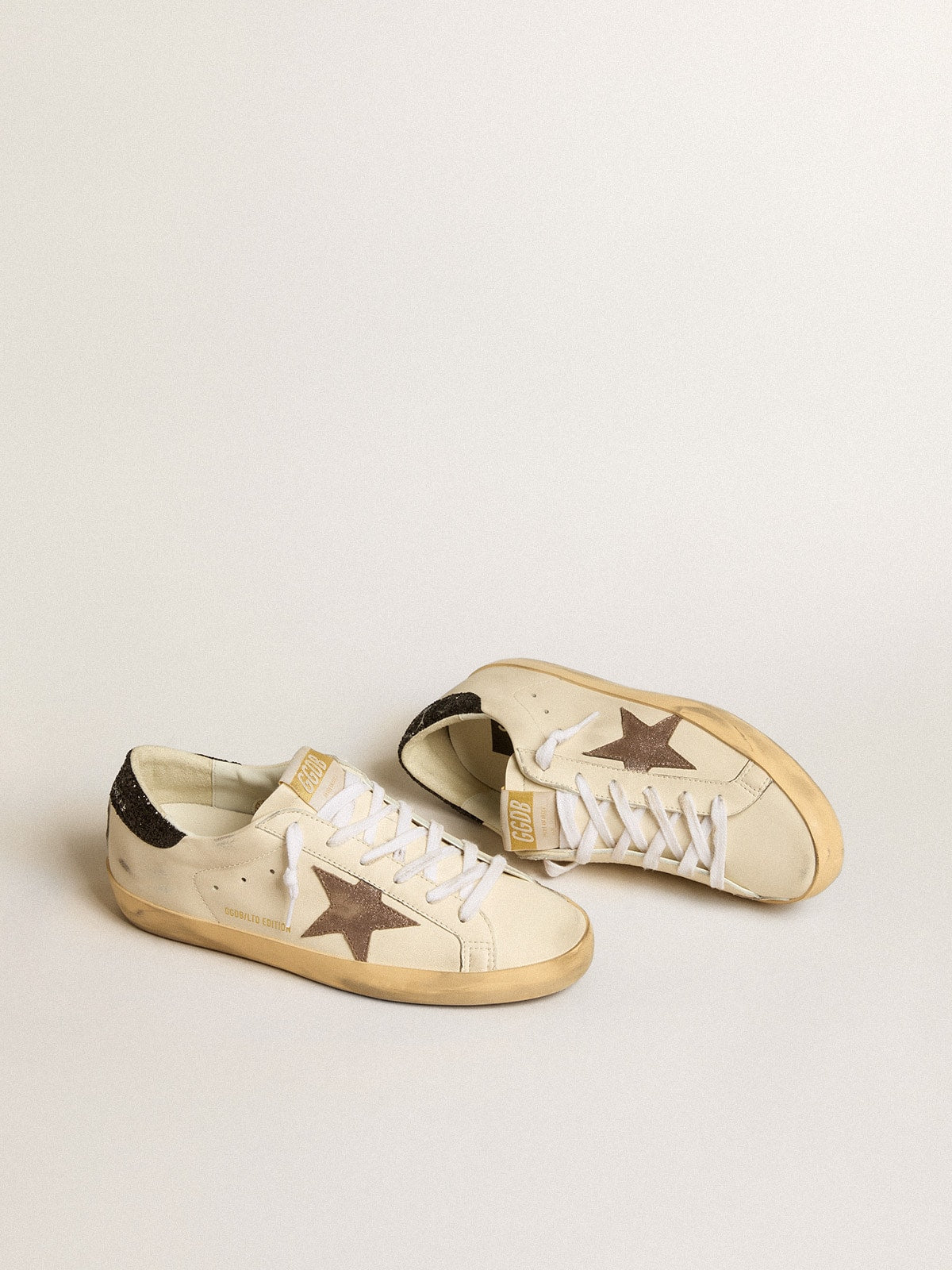 Super-Star LTD with laminated leather star and black glitter heel tab - Golden Goose Women