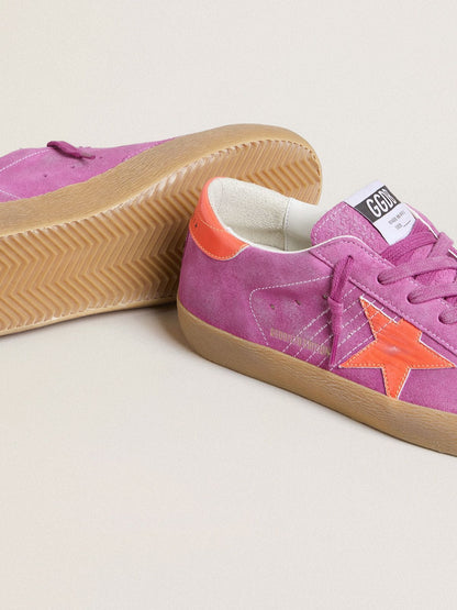 Women's Super-Star in fuchsia suede with fluorescent orange laminated leather star and heel tab - Golden Goose Women
