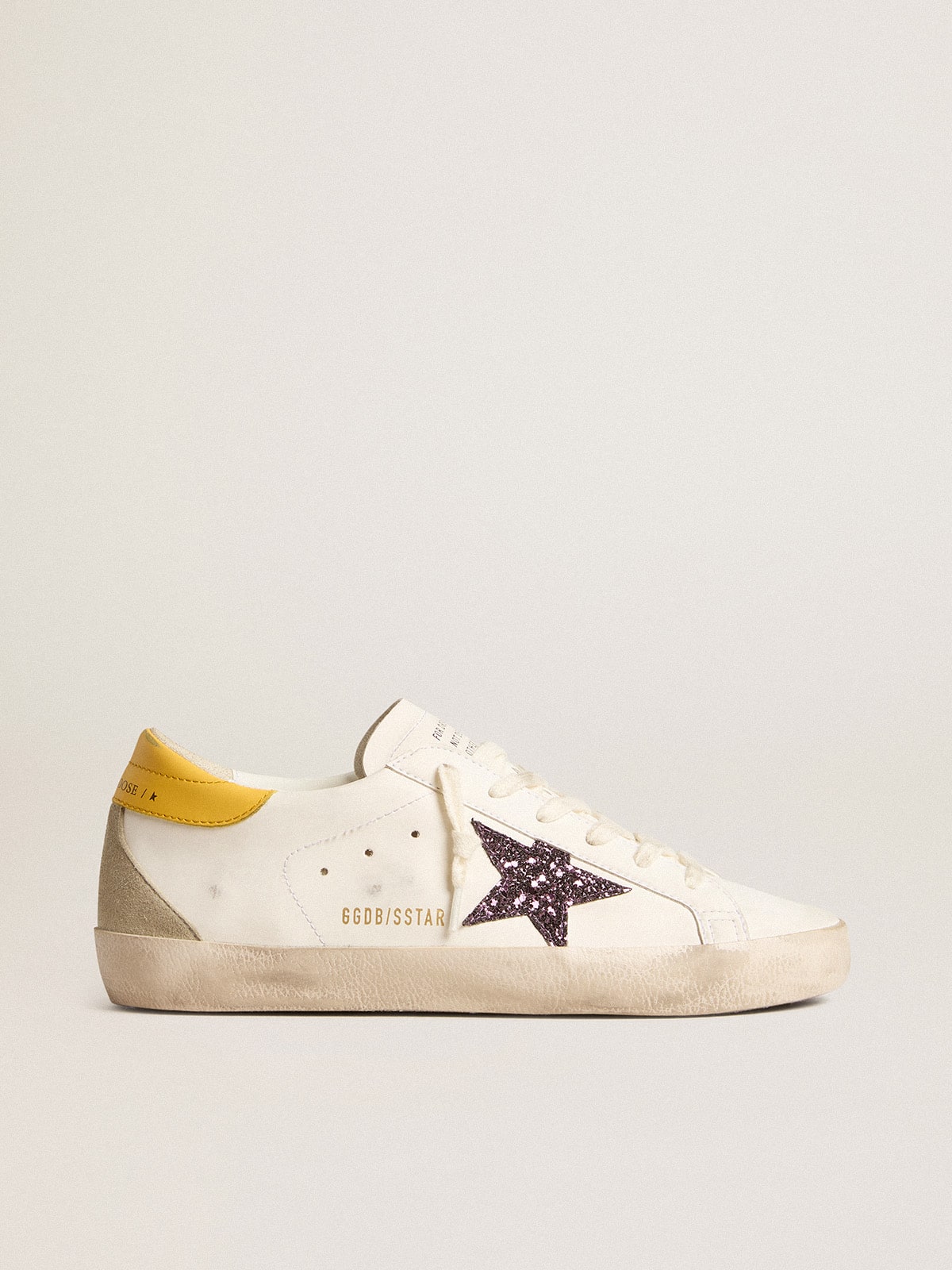 Women’s Bio-based Super-Star with red glitter star and leather heel tab - Golden Goose Women