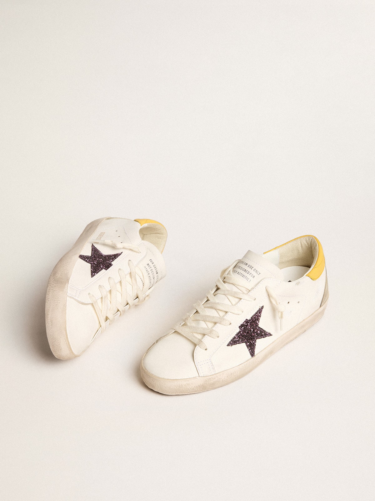 Women’s Bio-based Super-Star with red glitter star and leather heel tab - Golden Goose Women