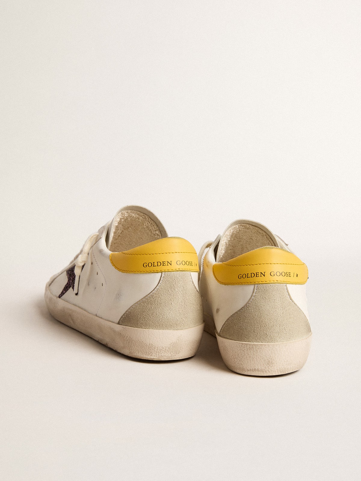 Women’s Bio-based Super-Star with red glitter star and leather heel tab - Golden Goose Women