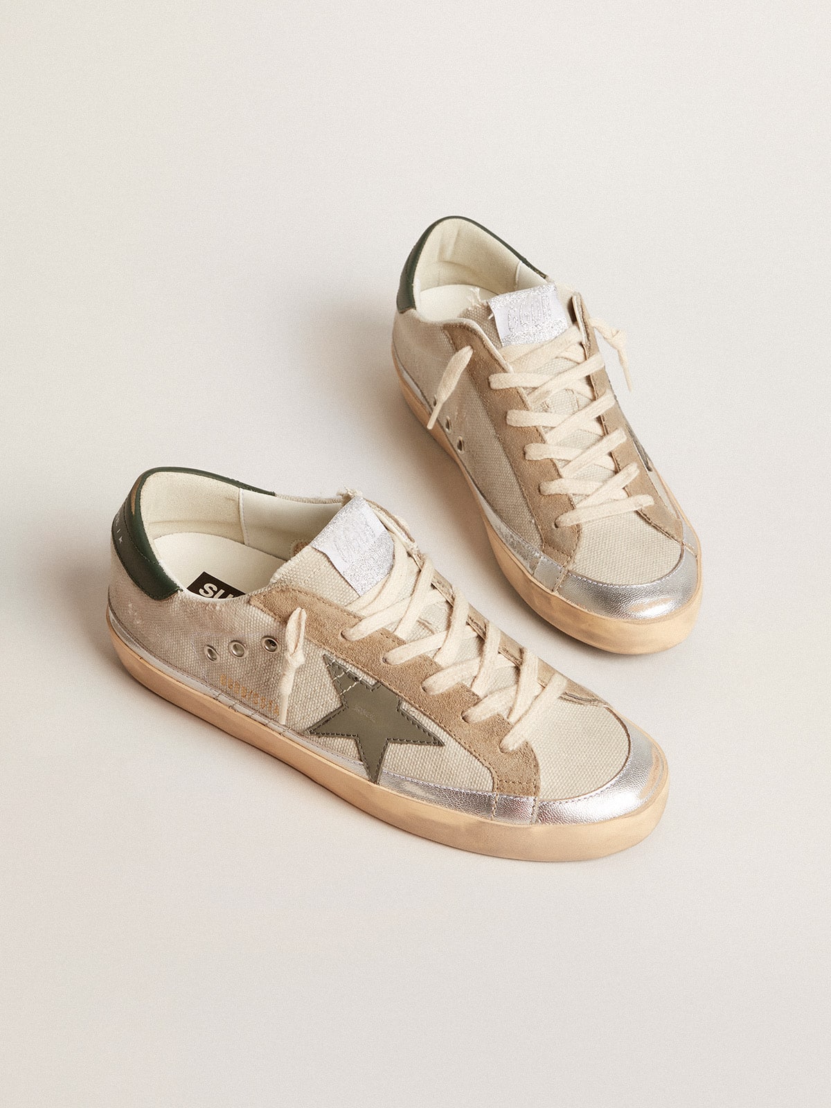 Super-Star in gray canvas with a green leather star and heel tab - Golden Goose Women