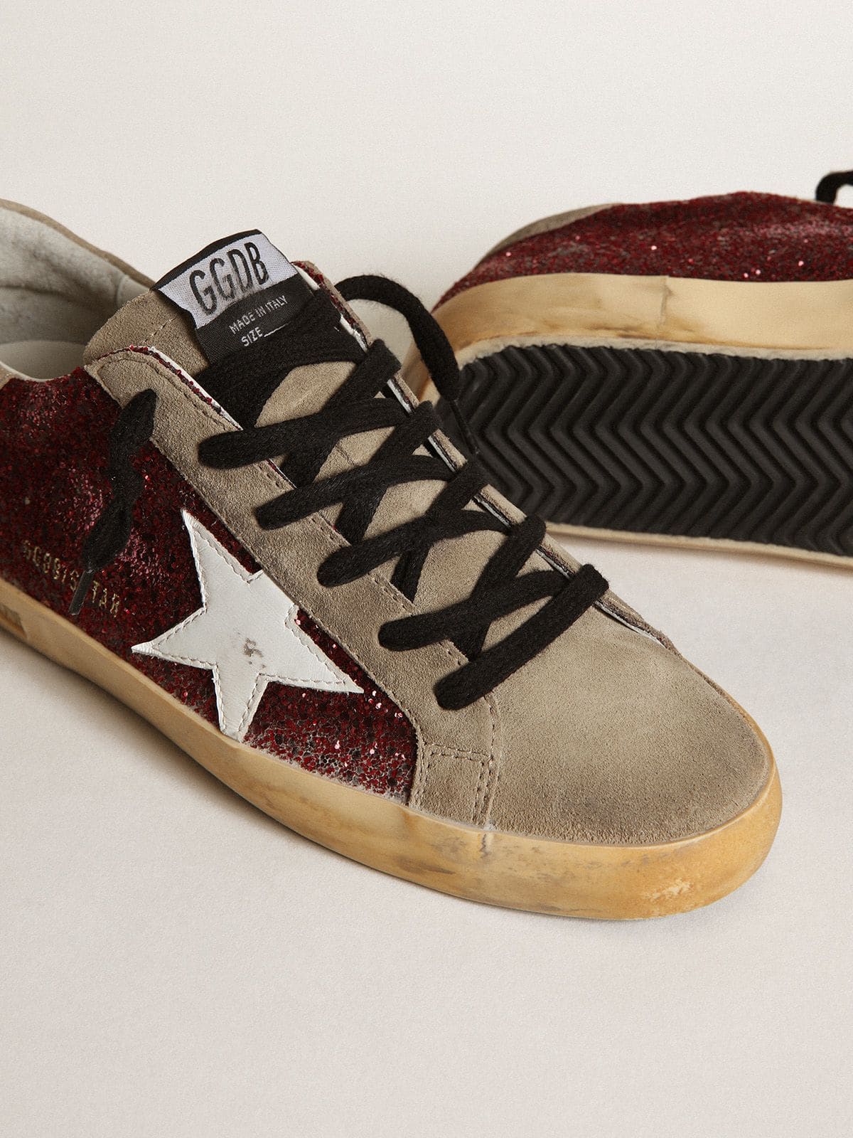 Women's Super-Star in burgundy glitter with white leather star and dove-gray suede tongue - Golden Goose Women