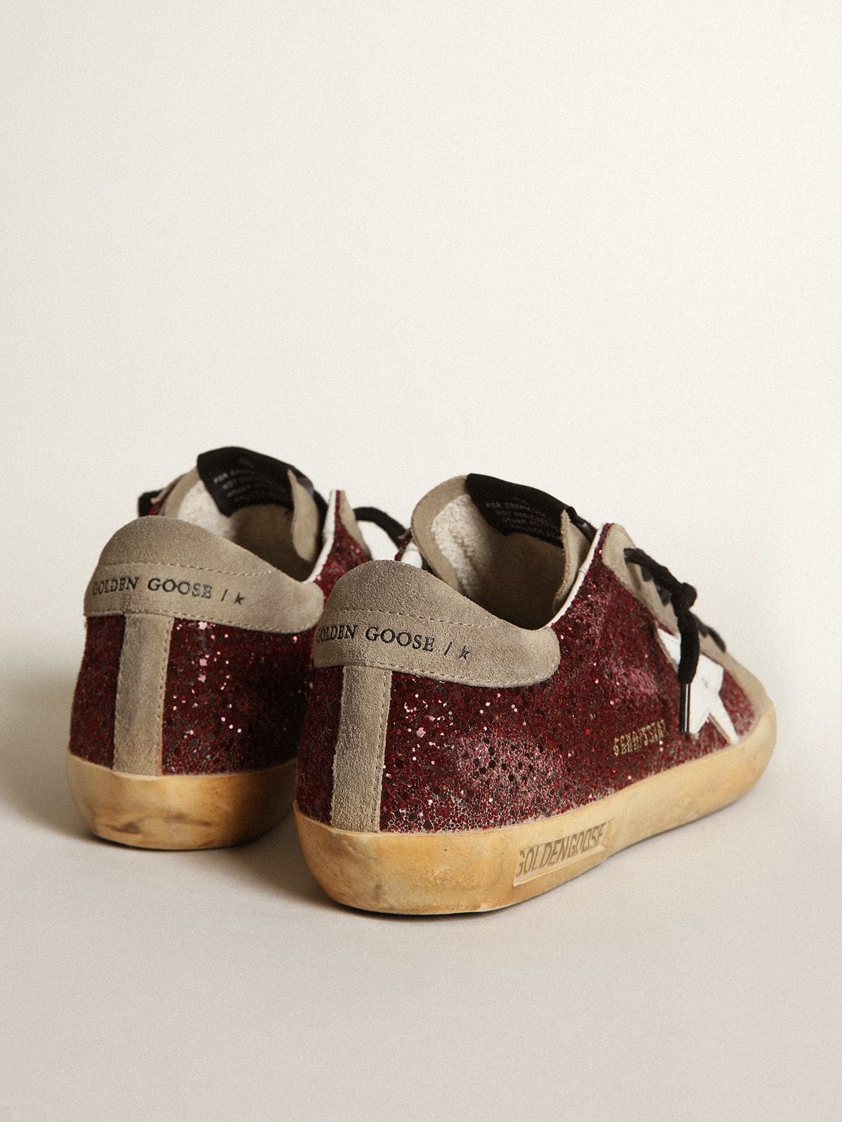 Women's Super-Star in burgundy glitter with white leather star and dove-gray suede tongue - Golden Goose Women