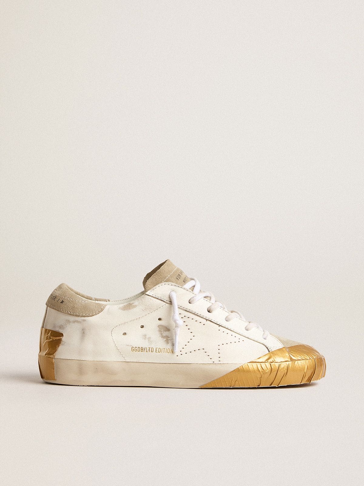 Women's Super-Star LTD in white leather with ice-gray suede inserts and gold-colored tape - Golden Goose Women