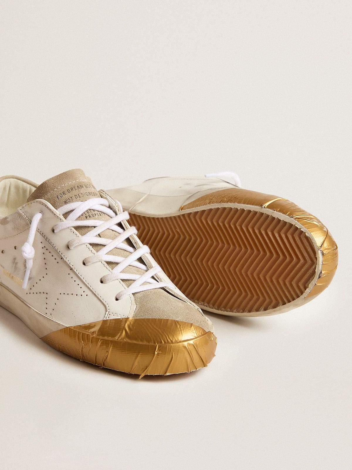 Women's Super-Star LTD in white leather with ice-gray suede inserts and gold-colored tape - Golden Goose Women