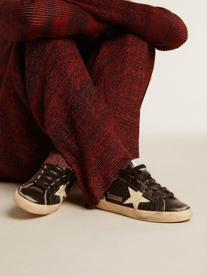 Women's Super-Star in black glitter and nappa with cream leather star and heel tab - Golden Goose Women