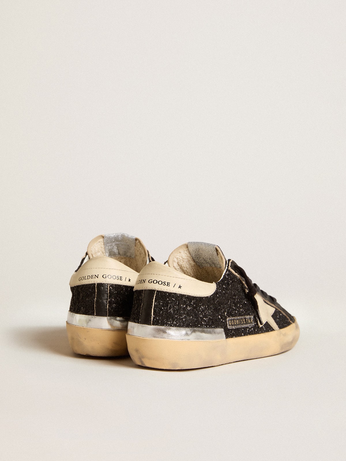 Women's Super-Star in black glitter and nappa with cream leather star and heel tab - Golden Goose Women