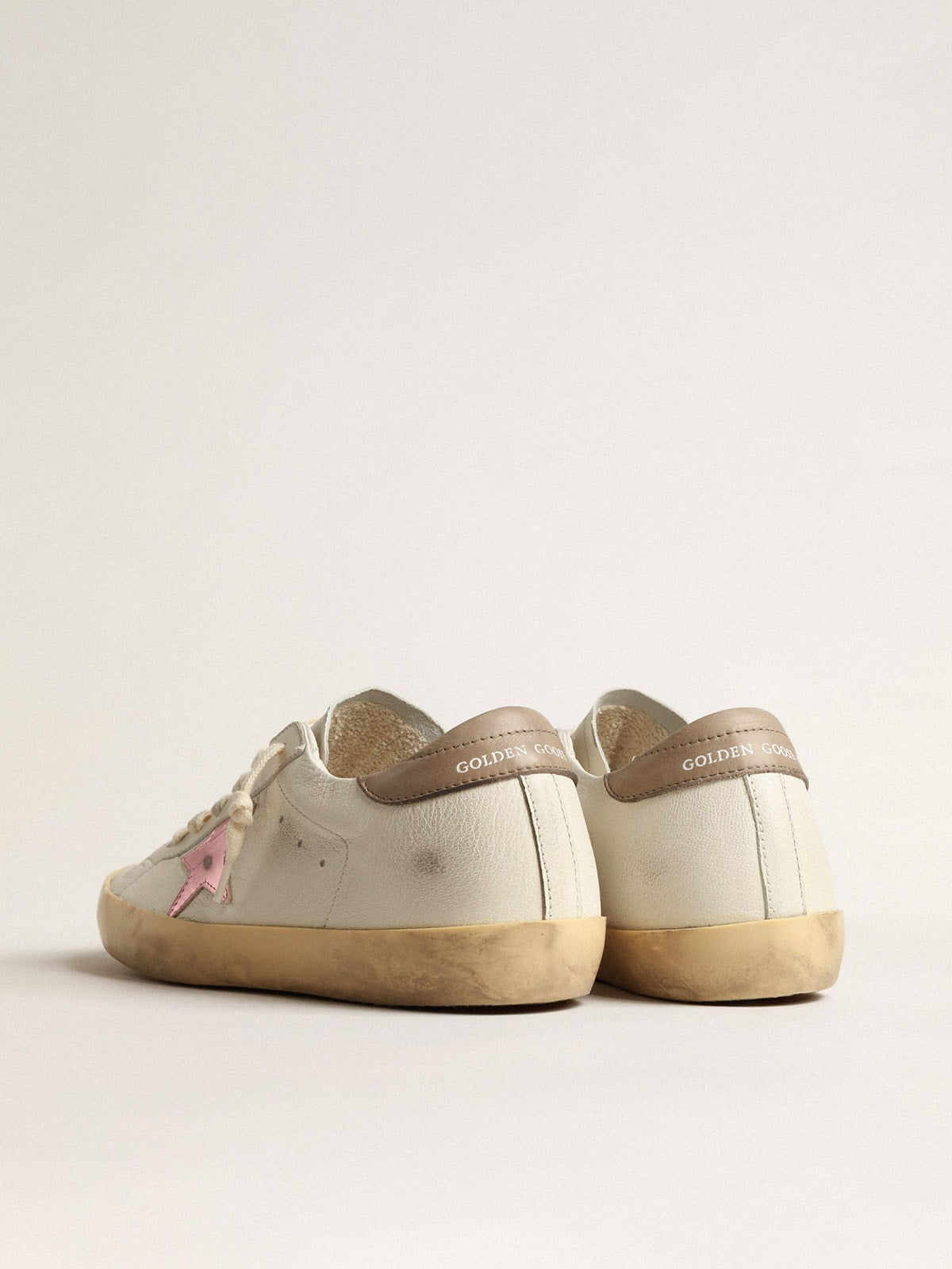 Women's Super-Star in white nappa with pink metallic leather star - Golden Goose Women