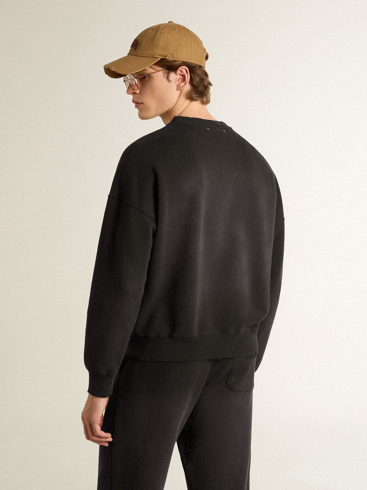 Unisex sweatshirt in worn black cotton with logo embroidery - Golden Goose Women|Men
