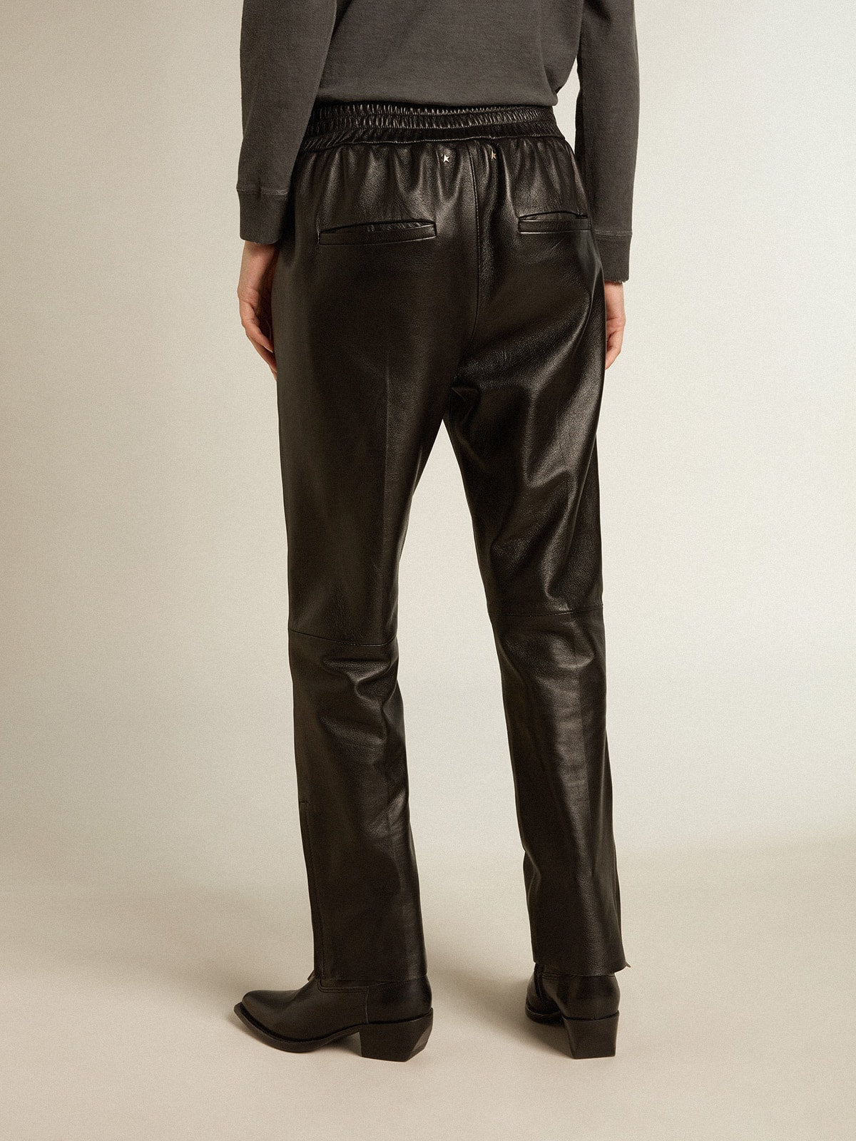 Black joggers in nappa leather with zip at the base - Golden Goose Women