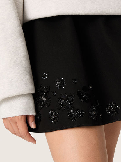 Women’s miniskirt in black cotton twill with floral sequin embroidery - Golden Goose Women