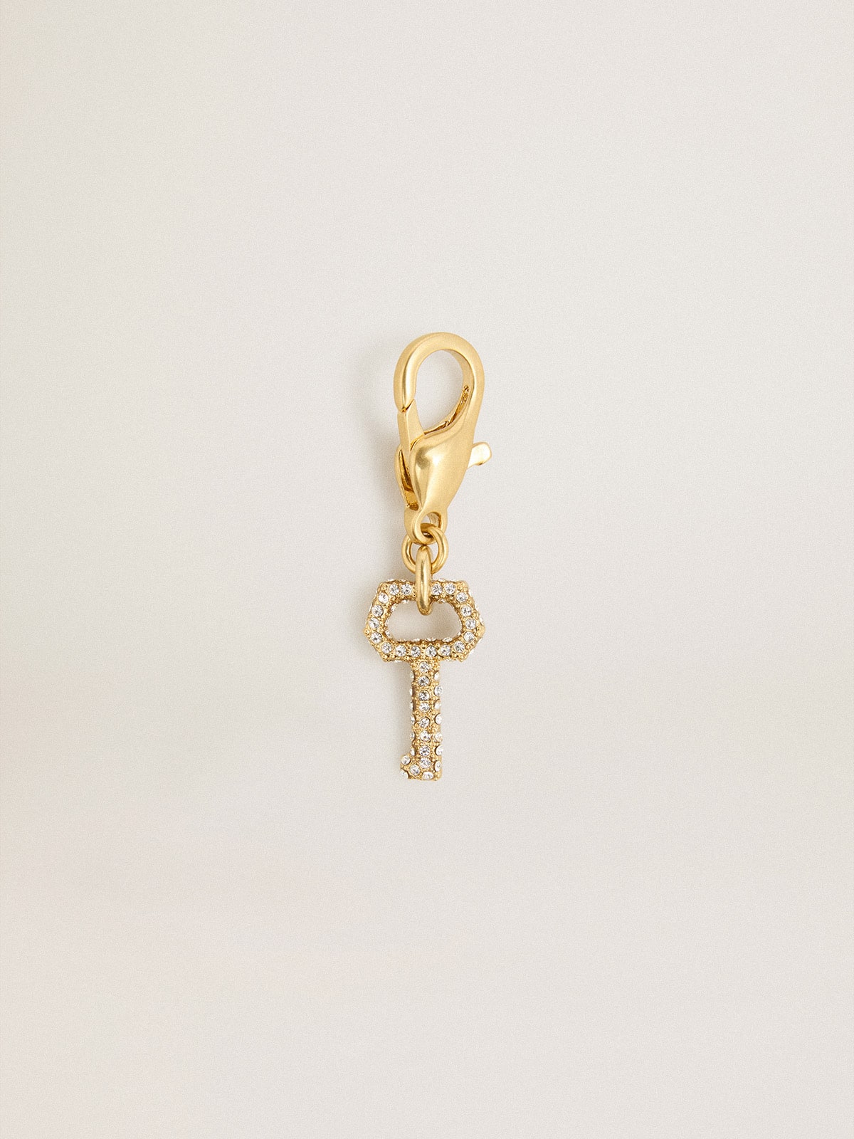 Key-shaped charm in gold-colored brass with crystals - Golden Goose Women