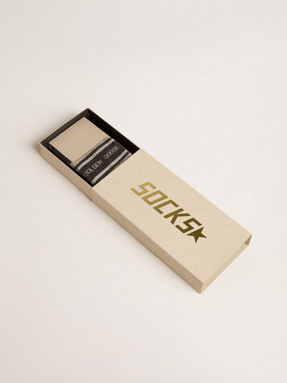 Dark grey socks with distressed details and cream and worn-white stripes - Golden Goose Women|Men